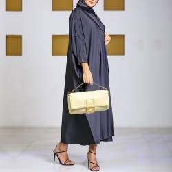 مملوكة مسبقًا Fendi Yellow Zucca Embossed Leather Large Baguette Bag