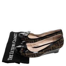 Pre Owned Fendi Black/Brown Zucca Canvas and Leather Bow Wedge Pumps Size 40