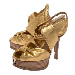 Pre Owned صندل فندى فتحة كعب نعل سميك جلد ذهبى مقاس 38