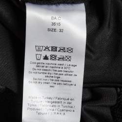 مملوكة مسبقًا قميص جاني أسود فيلور مطوي عند العنق مقاس صغير جداً (إكس سمول)