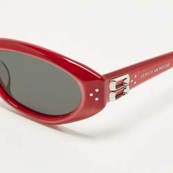 Pre Owned نظارة شمسية جنتل مونستر دنس إطار أحمر/أسود بيضاوية