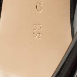 مملوكة مسبقًا حذاء بوت بطول الكاحل أربطة مقدمة مدببة جلد لامع أسود جيانفيتو روسي مقاس 35.5