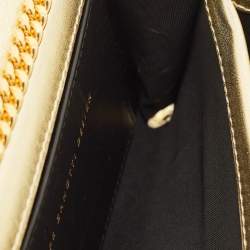 مملوكة مسبقًا حقيبة كلتش جوسيبي زانوتي جلد بنقشة جلد الثعبان الذهبي بغطاء وشعار وسلسلة