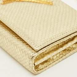 مملوكة مسبقًا حقيبة كلتش جوسيبي زانوتي جلد بنقشة جلد الثعبان الذهبي بغطاء وشعار وسلسلة