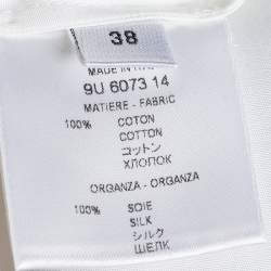 Pre Owned قميص جيفنشي  أورغانزا قطن أبيض بلا أكمام وبحواف مكشكشة مقاس متوسط - ميديوم