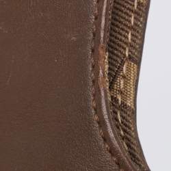 Pre Owned Givenchy Brown/Beige Monogram Canvas and Leather Buckle Flap Hobo