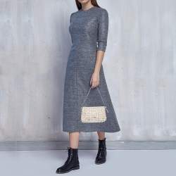 Pre Owned Givenchy Silver/Beige Signature Canvas and Leather Small Baguette Bag