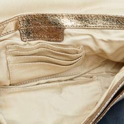 Pre Owned Givenchy Gold Crinkled Leather Cut Out Metal Handle Clutch