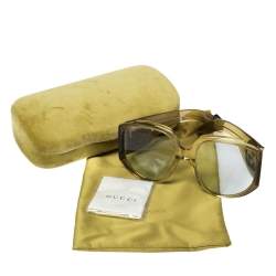 مملوكة مسبقًا نظارة شمسية غوتشي جي جي0151أس كبيرة الحجم مزينة شعار الماركة جي جي متداخل صفراء