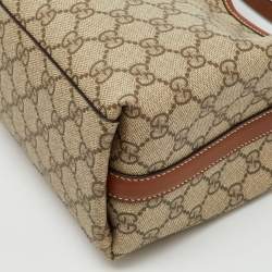 Pre Owned Gucci Beige/Brown GG Supreme Canvas and Leather GG Emblem Small Bucket Bag