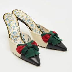 مملوكة مسبقًا حذاء سلايد غوتشي جلد أسود/كريمي مزين فيونكة ويب مقدمة مدببة مقاس 37.5