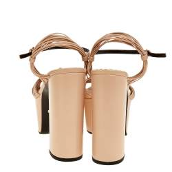 مملوكة مسبقًا صندل غوتشي كراك فورد بعقدة جلد بيج حزام للكاحل نغل سميك مقاس 38.5