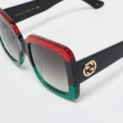 مملوكة مسبقًا نظارة شمسية غوتشي GG0083S حمراء/خضراء جليتر متشابكة جي كبيرة الحجم