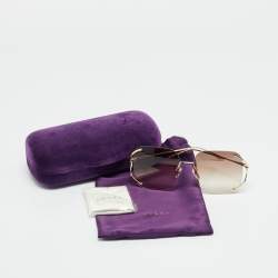 Pre Owned نظارة شمسية غوتشي GG0646S بيج/ذهبي متدرج بدون إطار كبيرة الحجم