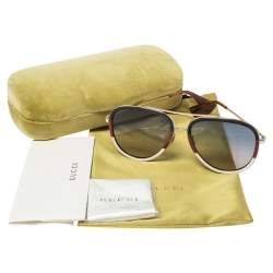 مملوكة مسبقًا نظارة شمسية غوتشي جي جي0062أس افياتور غرادينت أزرق و خطوط متعددة الألوان