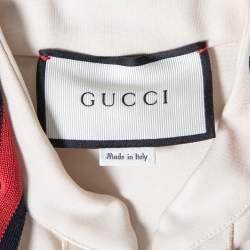 Pre Owned فستان غوتشي ميني سحاب أمامي تفاصيل ربطة عنق مخطط ويب جيرسي كريمي مقاس صغير جداً