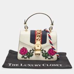 Pre Owned Gucci Off White Leather Mini Floral Patch Sylvie Top Handle Bag
