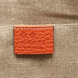 Pre Owned Gucci Orange Leather Bamboo Tassel Zip Pouch