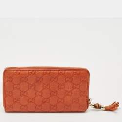 Gucci Orange Guccissima Leather Bamboo Tassel Zip Around Wallet