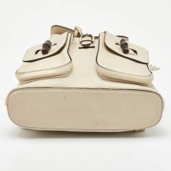 Pre Owned Gucci Off White Pebbled Leather GG Bamboo Tassel Backpack