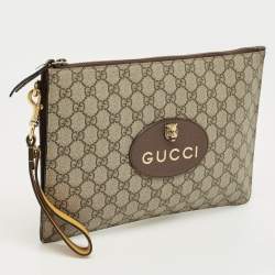 Pre Owned Gucci Beige/Mustard GG Supreme Canvas and Leather Tiger Head  Wristlet Pouch