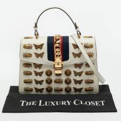 Pre Owned Gucci Off White Leather Medium Embellished Web Sylvie Top Handle Bag