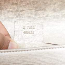 Pre Owned Gucci Metallic Beige Leather Bright Bit Clutch