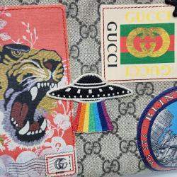 Pre Owned Gucci Beige Canvas and Leather Supreme Courier Crossbody Bag