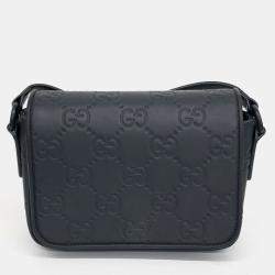 Pre Owned Gucci Black Leather GG Rubber-Effect Super Mini Bag