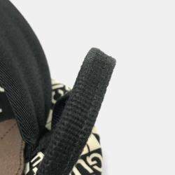 مملوكة مسبقًا حقيبة ظهر غوتشي سوداء وبيضاء وبنية