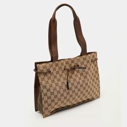 مملوكة مسبقًا حقيبة يد غوتشي كانفاس GG جلد بيج/بني بحبل غلق
