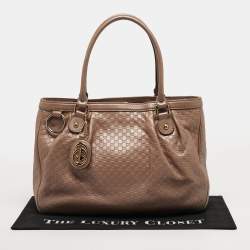 مملوكة مسبقًا حقيبة يد غوتشي سوكي جلد غوتشيسما لامع وردي ميتاليك