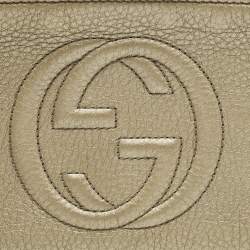 Pre Owned حقيبة كلاتش غووتشي سوههو جلد ذهبي ميتاليك بيد معصم