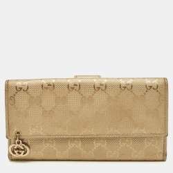 Pre Owned Gucci GG Twins Gold Imprime Canvas Continental Wallet