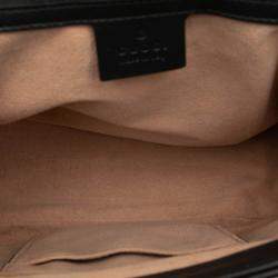 مملوكة مسبقًا حقيبة ظهر غوتشي ماجريت ملكة جلد العجل بلونين أبيض وأسود بمبو ترابونتاتا