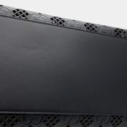 مملوكة مسبقًا حقيبة يد غوتشي بجلد أسود مزخرفة مع تفريغات بحجم متوسط