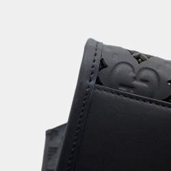 مملوكة مسبقًا حقيبة يد غوتشي بجلد أسود مزخرفة مع تفريغات بحجم متوسط