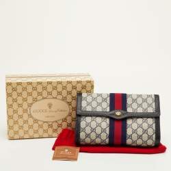 Pre Owned Gucci Vintage Sherry Line Beige/Navy Blue GG Supreme Canvas and Leather Clutch