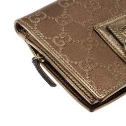 مملوكة مسبقًا محفظة غوتشي كومباكت حلقة D جلد وساتان ذهبية/ بنية