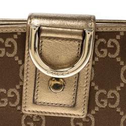 مملوكة مسبقًا محفظة غوتشي كومباكت حلقة D جلد وساتان ذهبية/ بنية