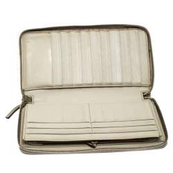 Pre Owned Gucci Beige Guccissima Leather Zip Around Wallet Organizer