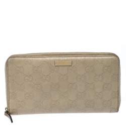 Pre Owned Gucci Beige Guccissima Leather Zip Around Wallet Organizer