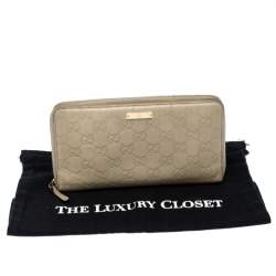 Pre Owned Gucci Beige Guccissima Leather Zip Around Wallet Organizer