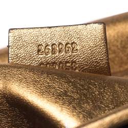 مملوكة مسبقًا حقيبة كلتش غوتشي مسائية ماليكا ساتان ذهبي/ أسود