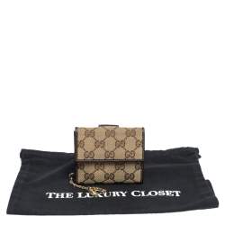 Gucci Brown/Beige GG Canvas and Leather Flap Compact Wallet with Charm