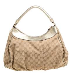 Pre Owned حقيبة هوبو غوتشي "دي رينغ" جلد و كانفاس جي جي ذهبي و بيج