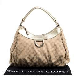 Pre Owned حقيبة هوبو غوتشي "دي رينغ" جلد و كانفاس جي جي ذهبي و بيج