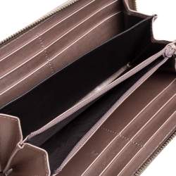 مملوكة مسبقًا Gucci Metallic Pink Guccissima Leather Interlocking G Zip Around Wallet   