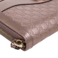 مملوكة مسبقًا Gucci Metallic Pink Guccissima Leather Interlocking G Zip Around Wallet   
