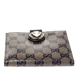 مملوكة مسبقًا Gucci Beige/Blue GG Crystal Coated Canvas and Leather Voyager Wallet